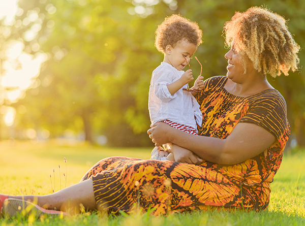 Image of mother and child smiling