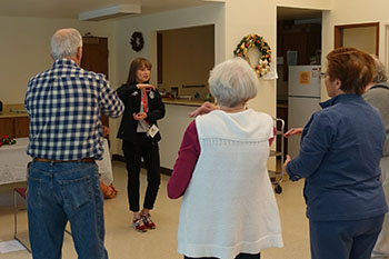 Elderly people practicing tai chi