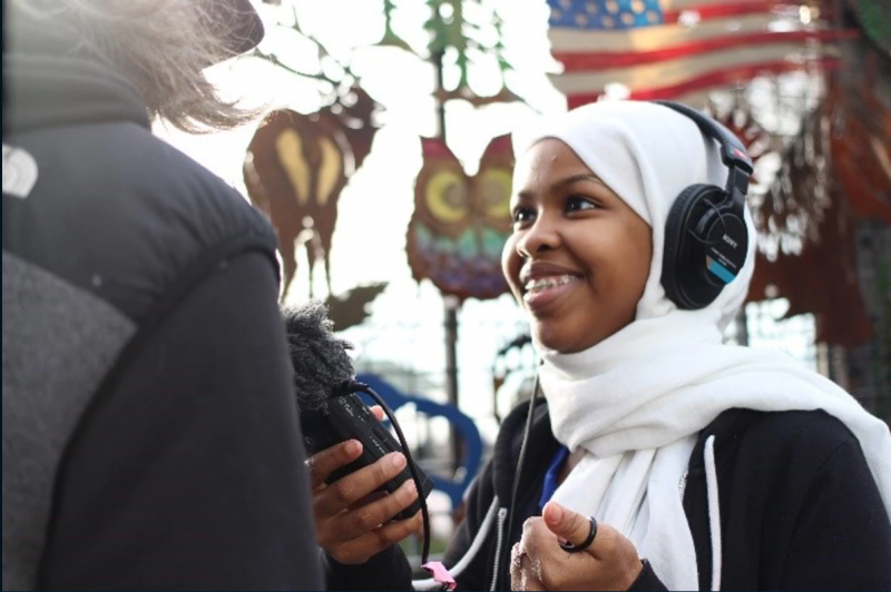 Teenage girl wearing headphones