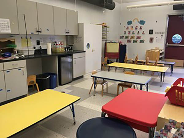 Room with tables and whiteboards