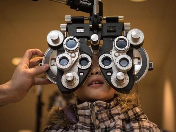 Woman getting eye test