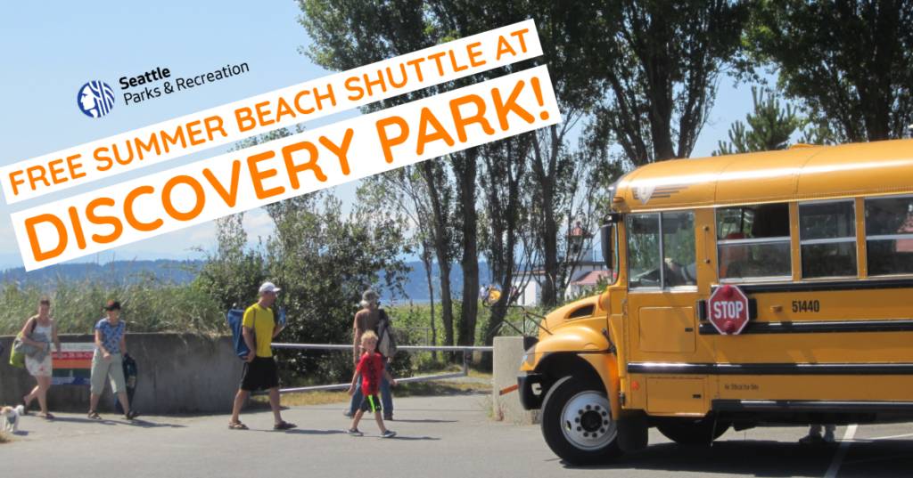 Sign with picture of bus and people in park parking lot and text of"Free Summer Beach Shuttle at Discovery Park"