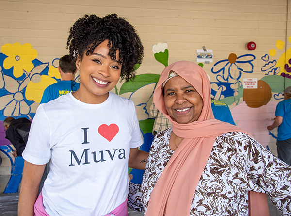 Mural artist Jonarra Swanson and SHA Resident Sarha