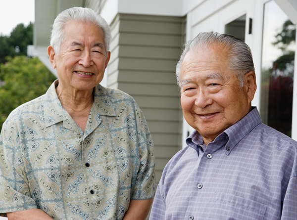 Two senior men standing