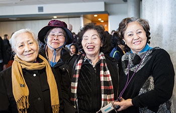 Four women standing