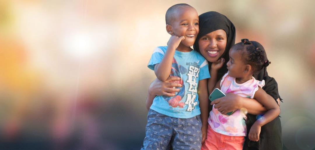 A woman and two children standing together