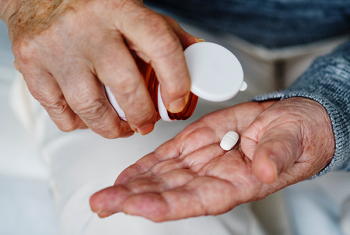 Pill in hand