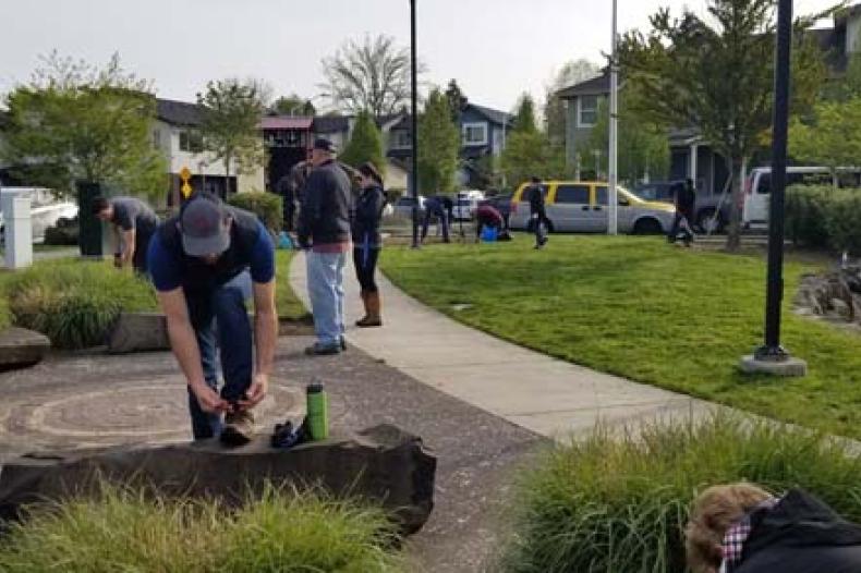 Man plants a new start in ground