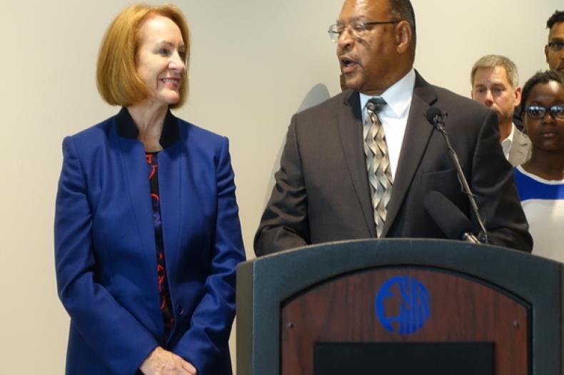 Two people at podium