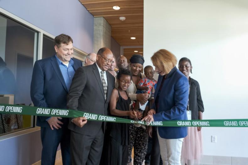 Seattle Mayor Jenny Durkan cuts ribbon at grand opening of Red Cedar apartment building