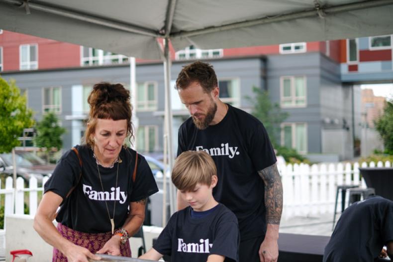 Sounders player Stefan Frei and others at RAVE Foundation event at Rave Field at Yesler Terrace Park