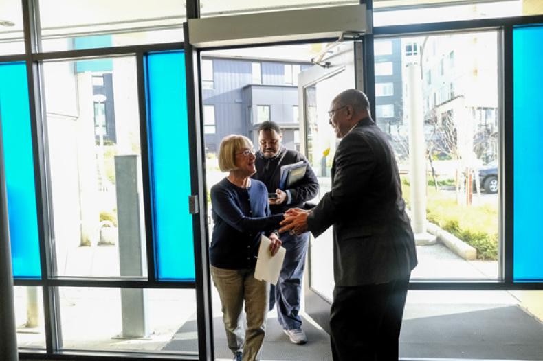 SHA Executive Director Andrew Lofton greeting Senator Patty Murray at Yesler 