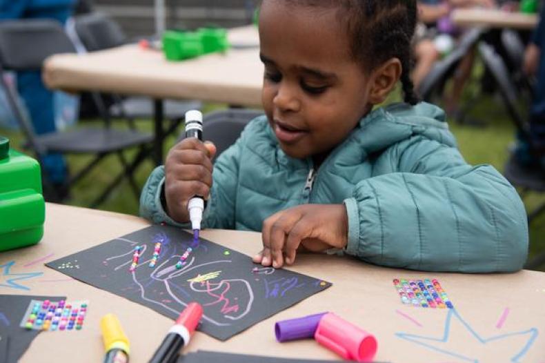 Image of young girl drawing