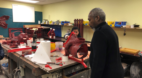 Man in studio with wax casting materials