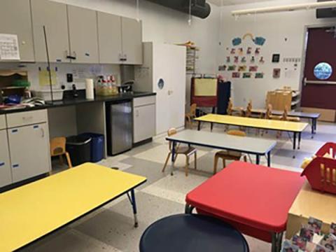 Room with tables and whiteboards