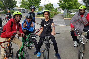 Five boys on bikes