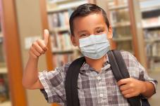 Child wearing face mask
