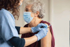 Woman receiving a vaccine