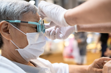 Person getting eyes checked at Seattle King County Clinic