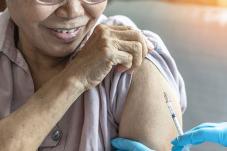 elderly woman getting vaccine
