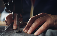 Image of person sewing