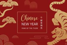 Blossoms and Tiger with text: 'Chinese New Year, Year of the Tiger'