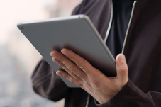 Person holding ipad