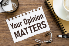 Image of sign that says "your opinion matters"