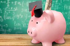 Pink piggy bank, pig wears graduation cap