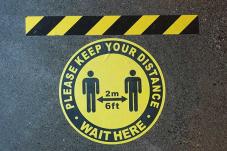 'Please keep your distance 6 ft' sign