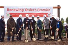 Officials break ground with shovels 