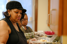 Woman serves food