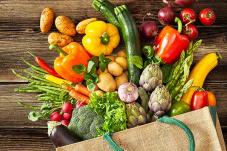 grocery bag with fresh vegetables