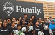 Russell Wilson, Ciara and yesler youth at Sounders celebration