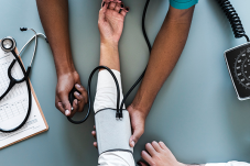 Person having blood pressure taken