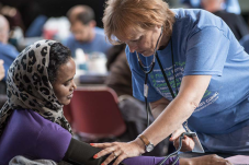 Woman getting blood pressure taken