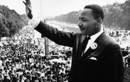Martin Luther King Jr. waving at crowds during1963 Civil Rights March in Washington D.C.