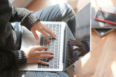 Person typing on laptop