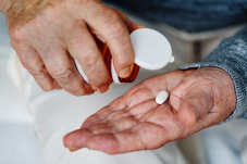 Pill in hand