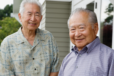 Two senior men standing