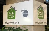 Sign with Seattle Housing Authority logo