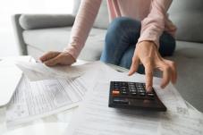Woman using a calculator