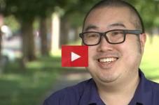 Video thumbnail of man standing and smiling