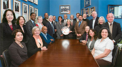 Senator Murray (center) with housing leaders. Click here to view larger.