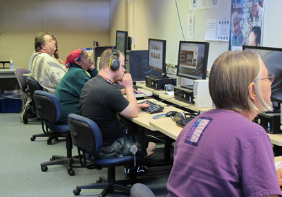 Several people were seen using the computers at the STAR Center computer lab during their open house on May 20, 2010.
